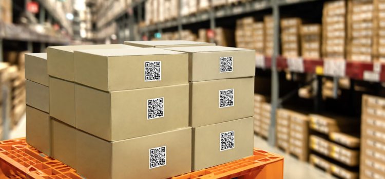 Boxes in a warehouse that utilizes a 3PL warehouse management system for inventory tracking