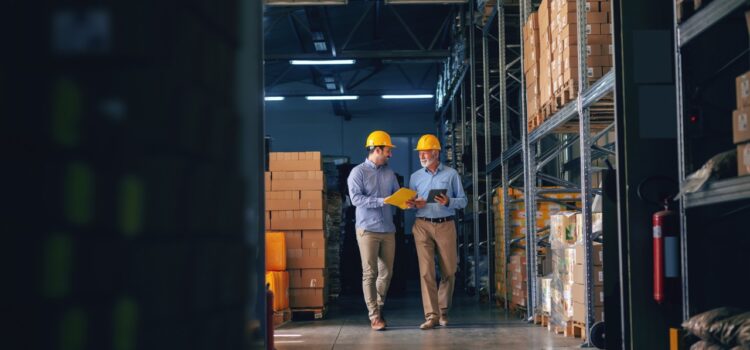 warehouse employees discussing strategy