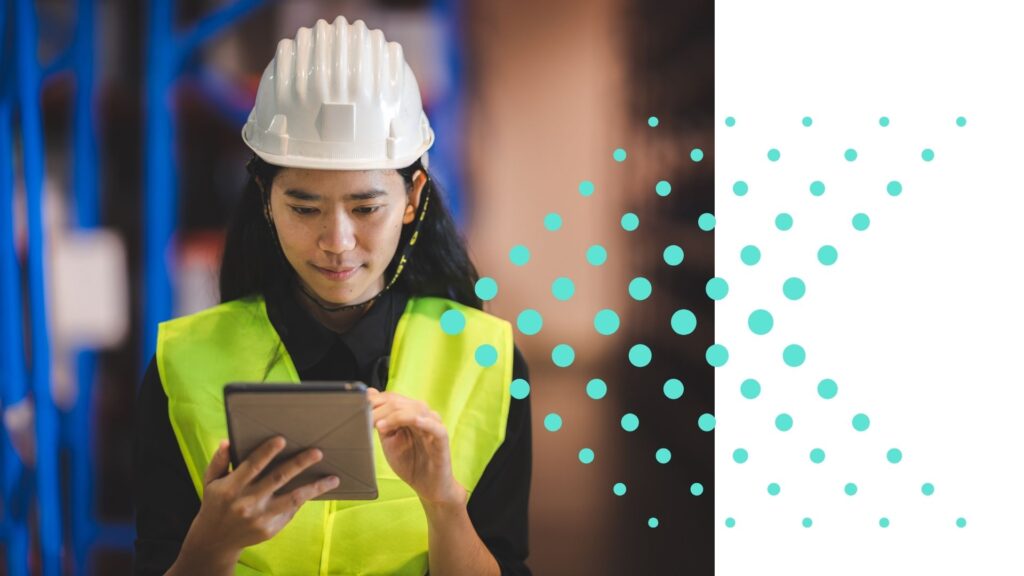 Warehouse worker working on tablet